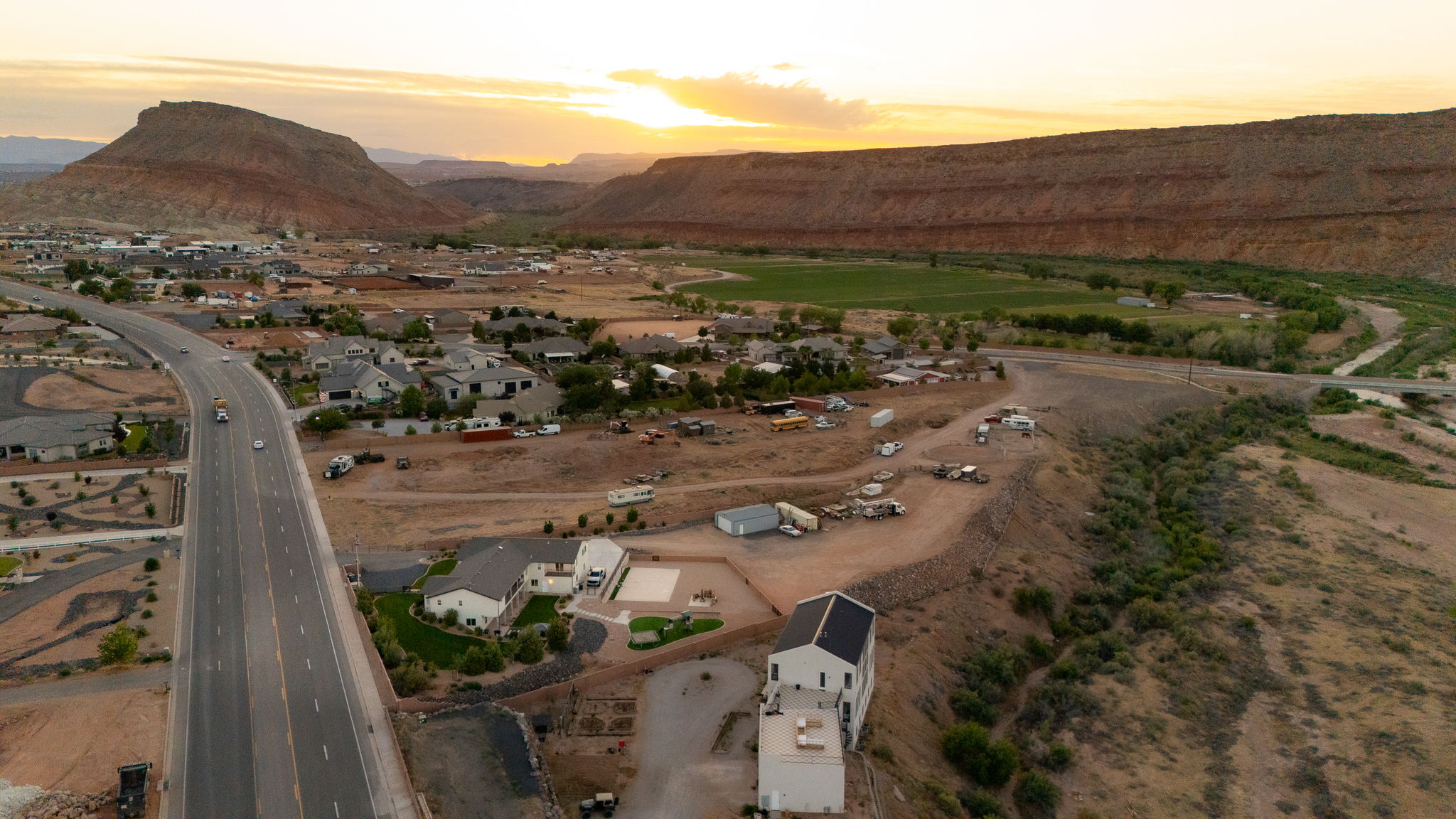 Aerial perspective showcasing an expansive desert landscape with distant mesas