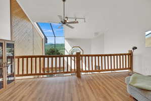 Vaulted ceilings with slatted wood-paneled accents