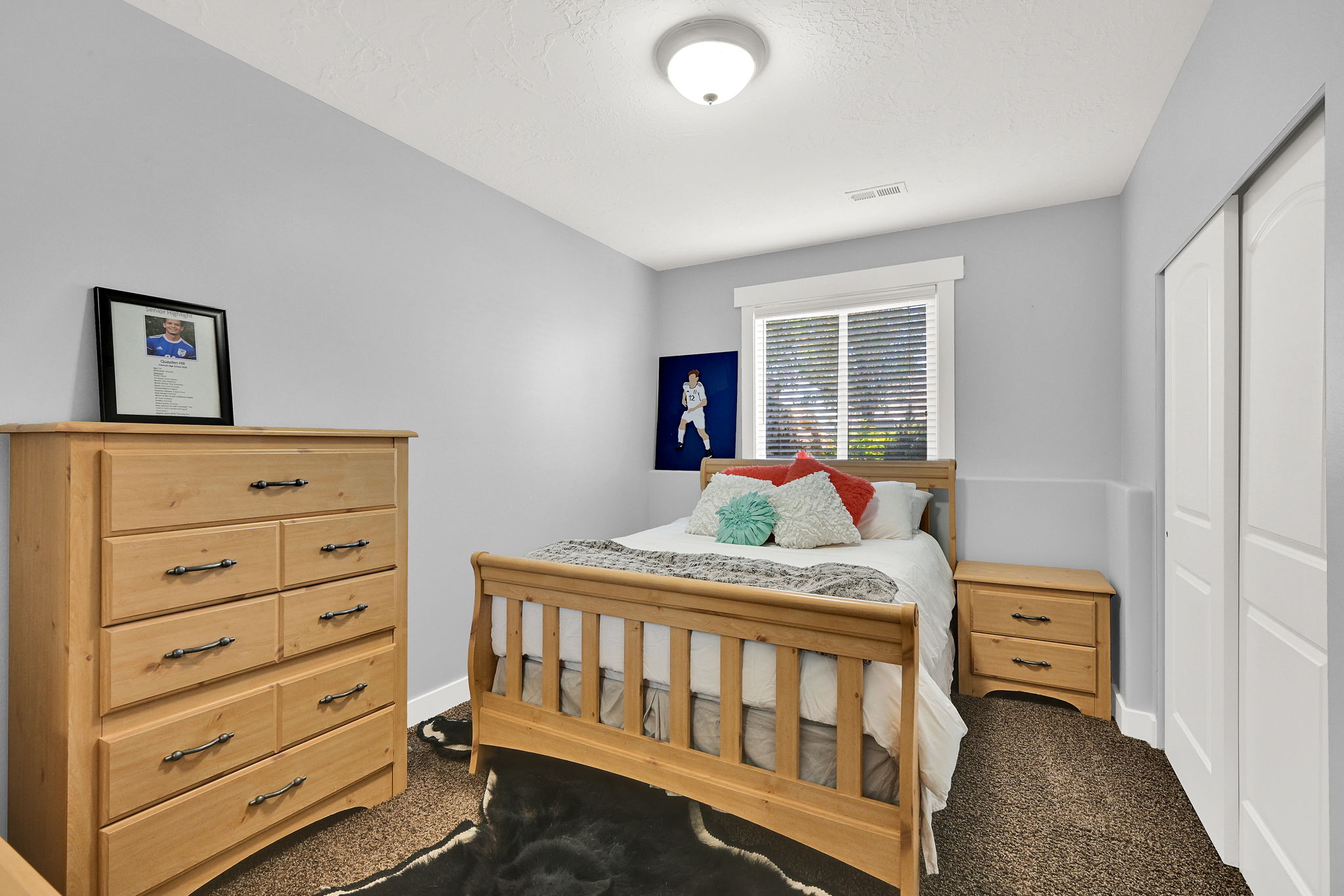 Light gray walls with a white trim accent band