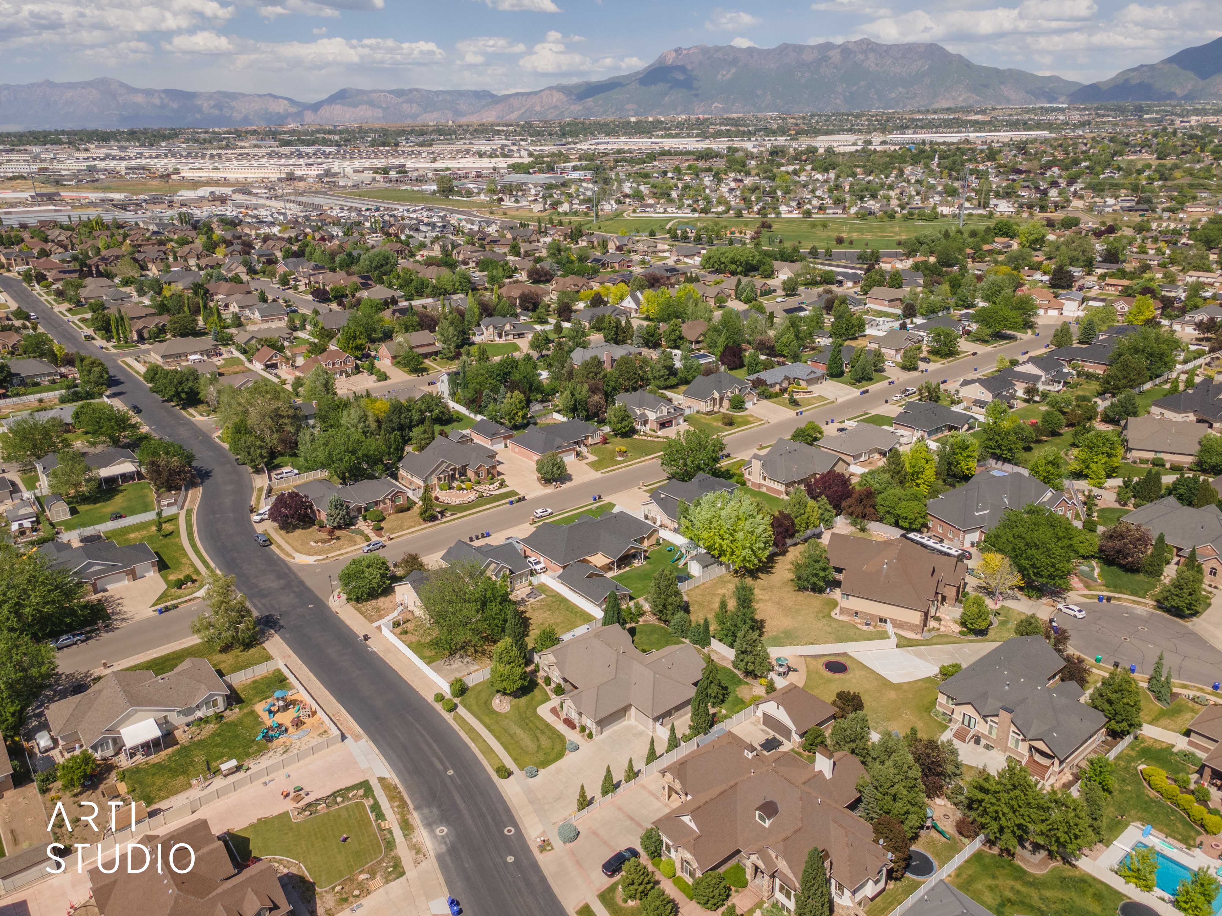 Aerial perspective showcasing a residential neighborhood with varied architectural styles