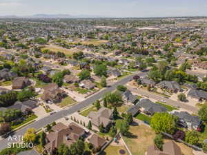 Sprawling residential neighborhood with established homes, mature landscaping, and paved streets