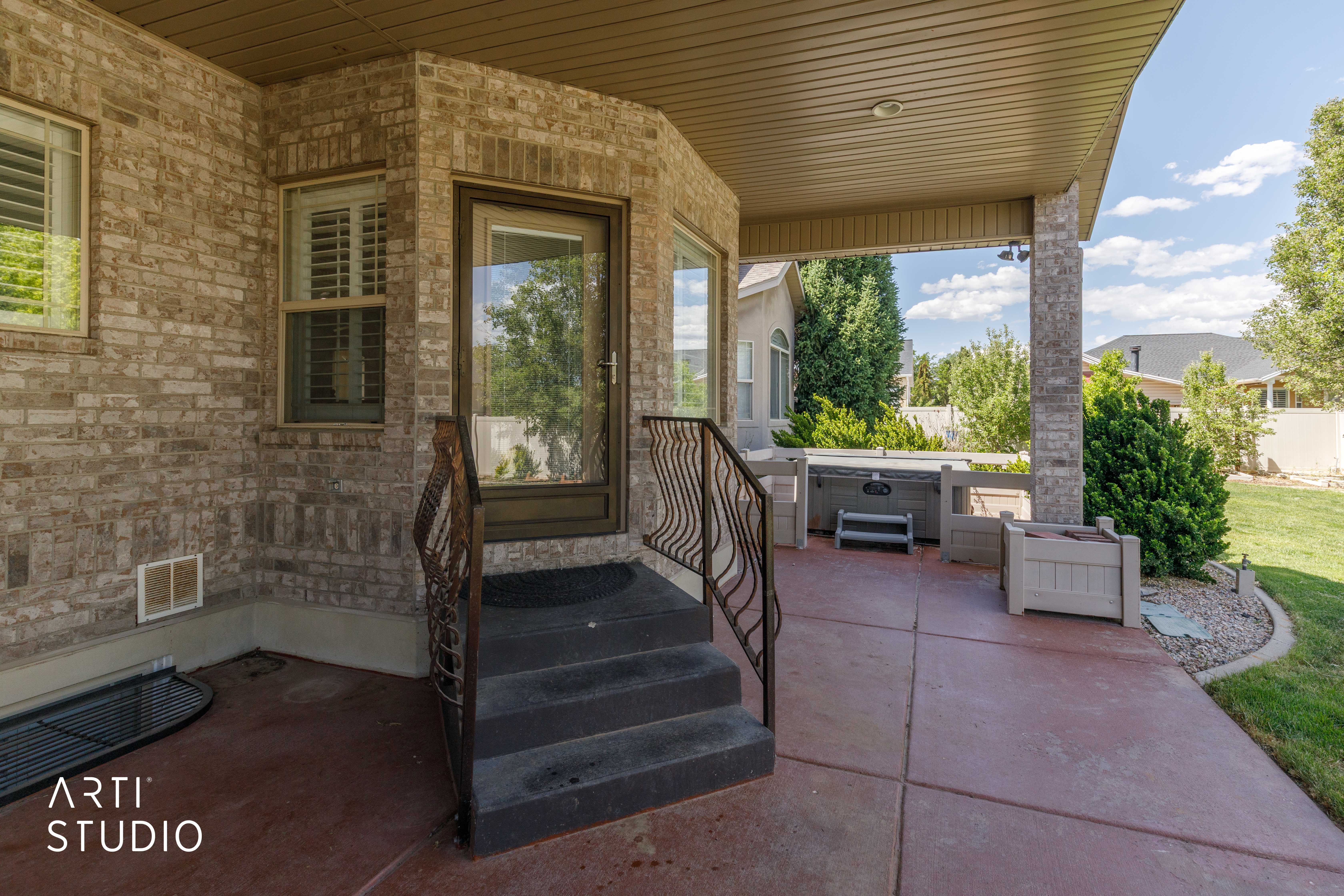 Covered patio featuring a stained concrete surface and direct access to the interior