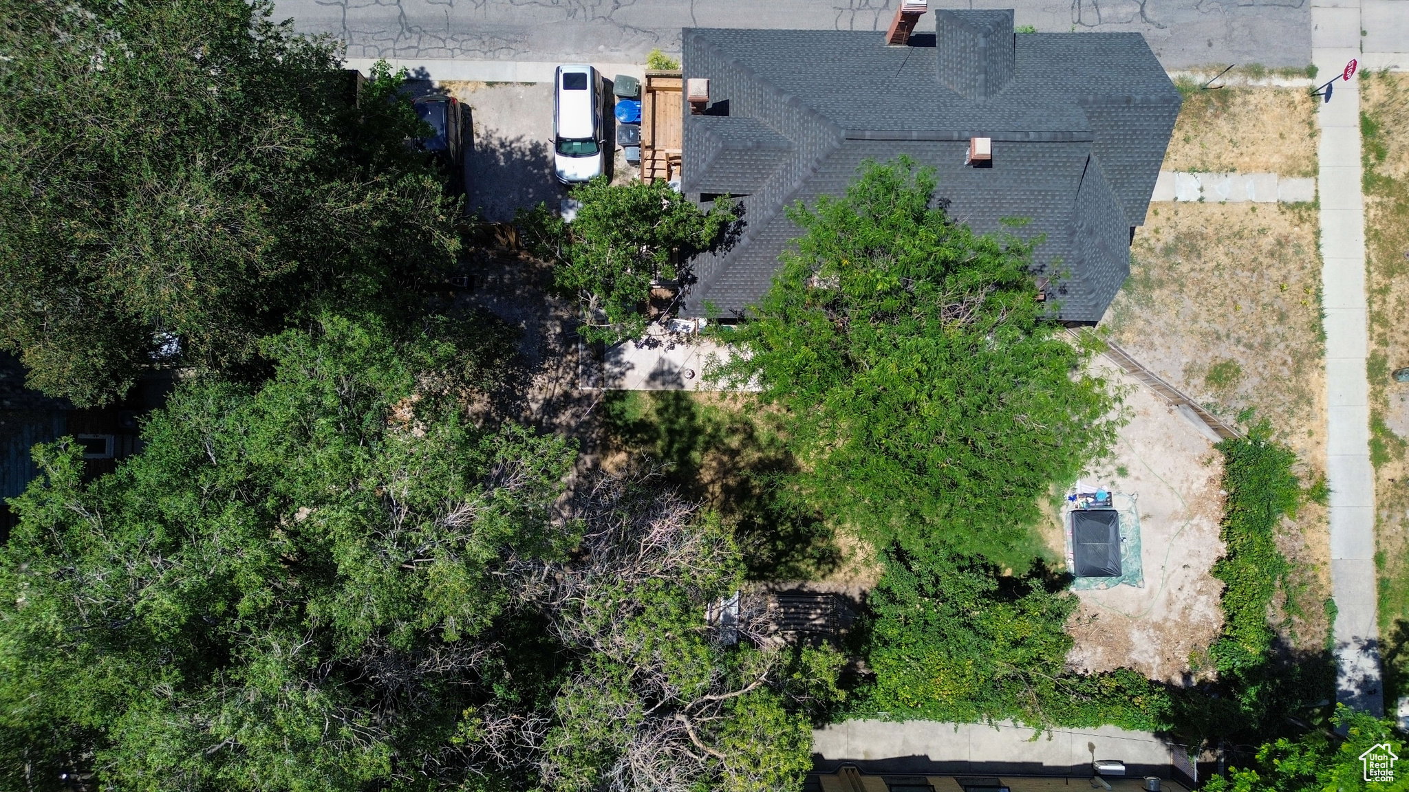 Aerial perspective showcasing the property's roofline and surrounding grounds