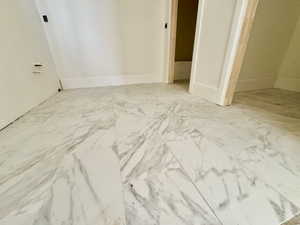White and grey variegated tile flooring