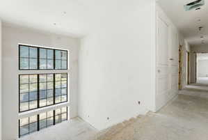Two-story wall of grid-pattern windows