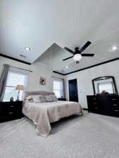 Spacious room featuring vaulted ceilings with recessed lighting and a decorative ceiling fan