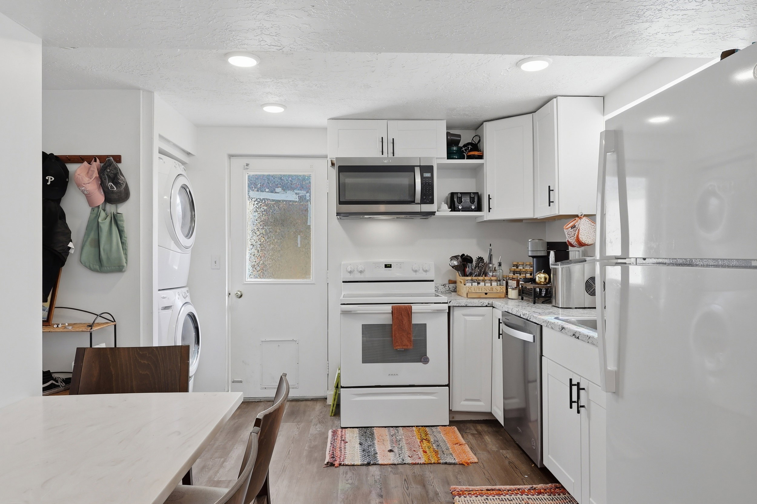 Basement Apartment kitchen, entrance, and laundry.