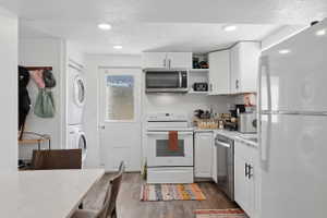 Basement Apartment kitchen, entrance, and laundry.