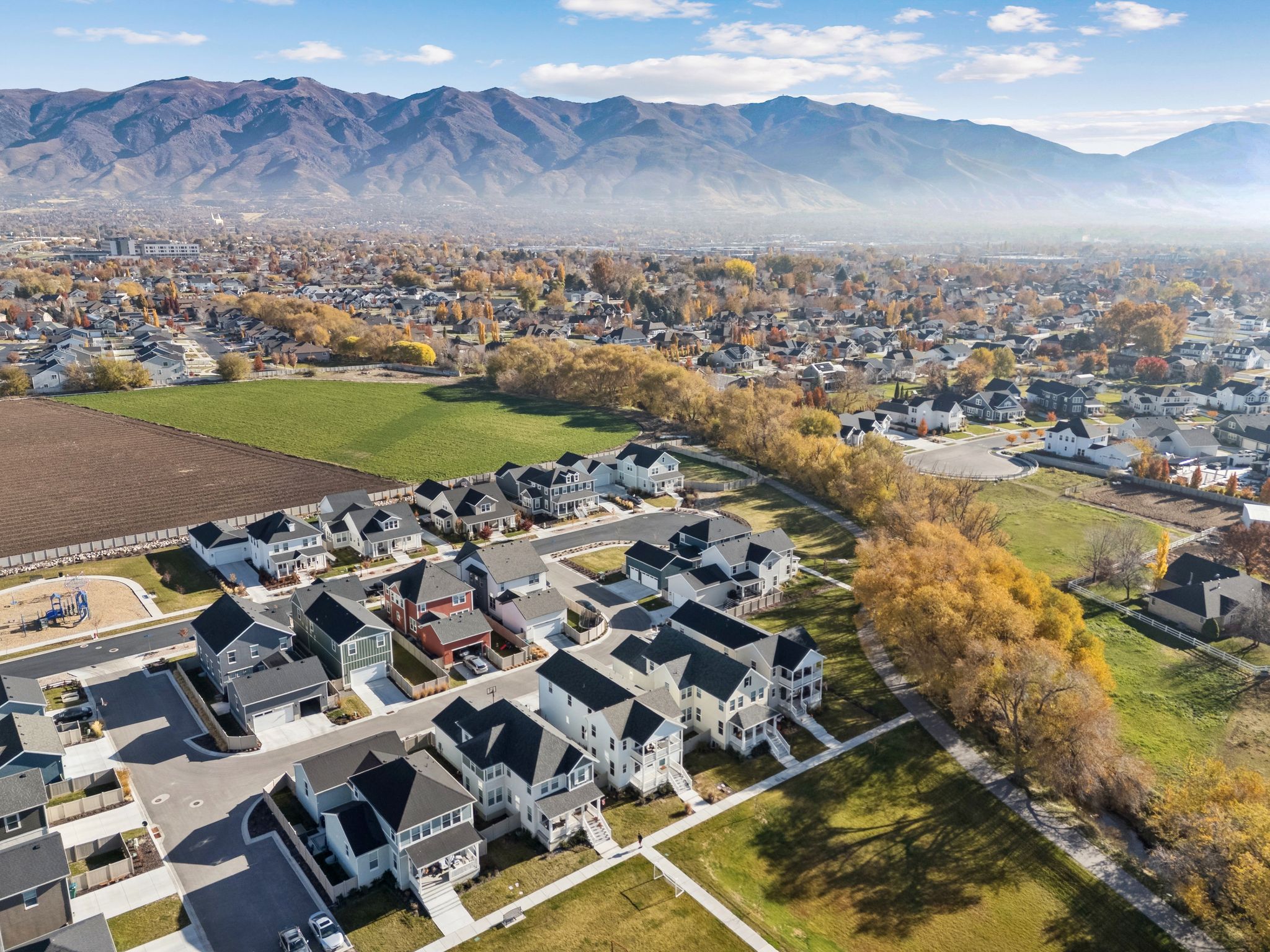 Aerial perspective showcasing a residential development with varied architectural styles