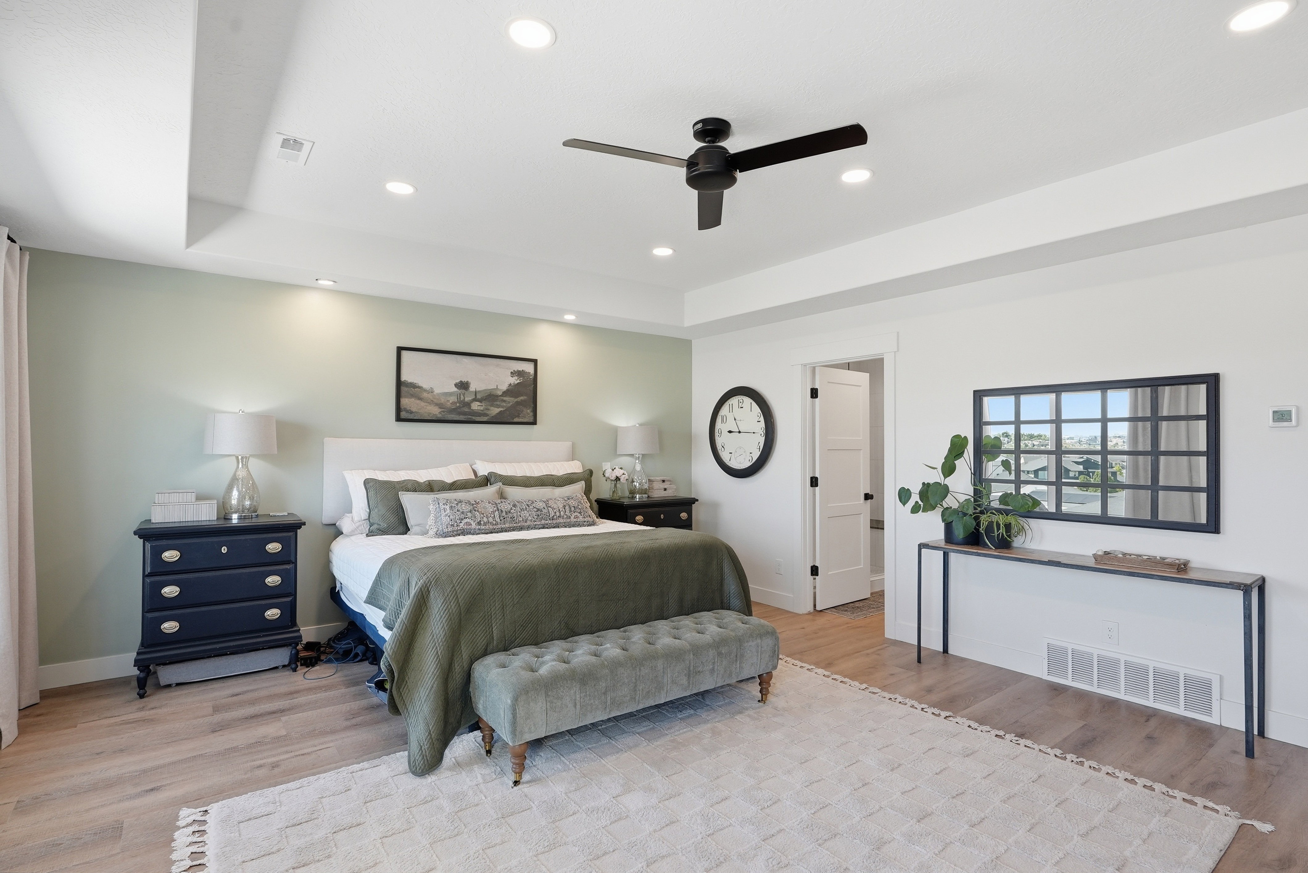 Recessed lighting illuminates LVP flooring
