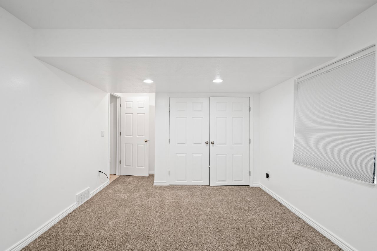 Below grade area featuring carpet and recessed lighting