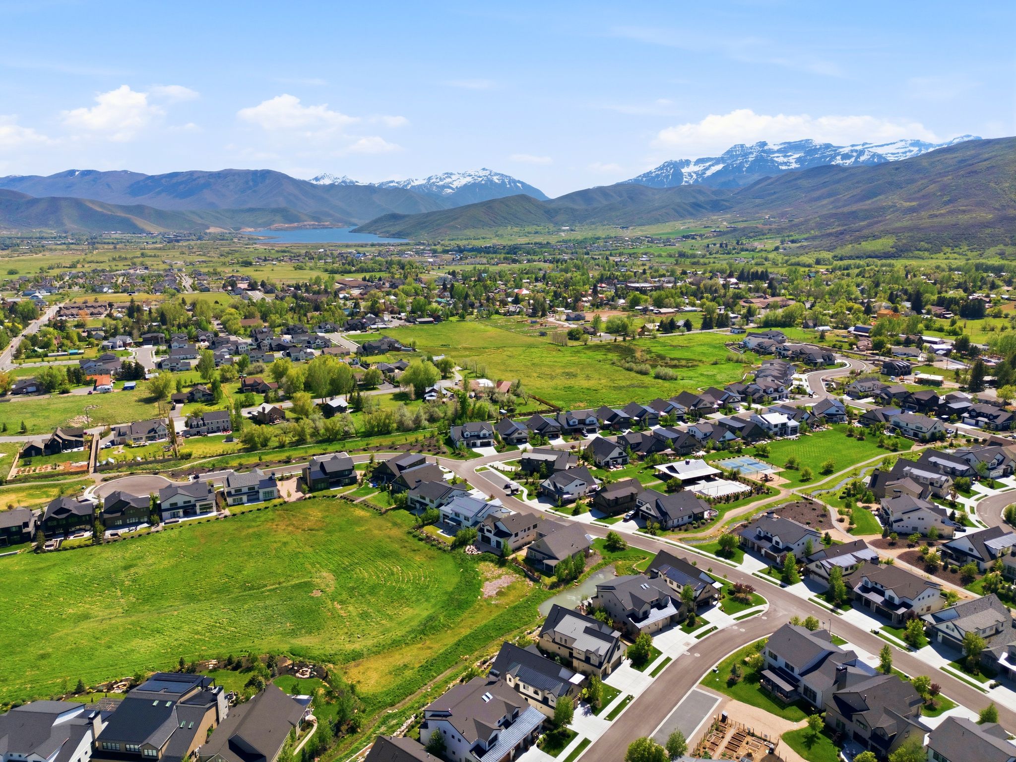 Expansive mountain valley setting featuring residential development