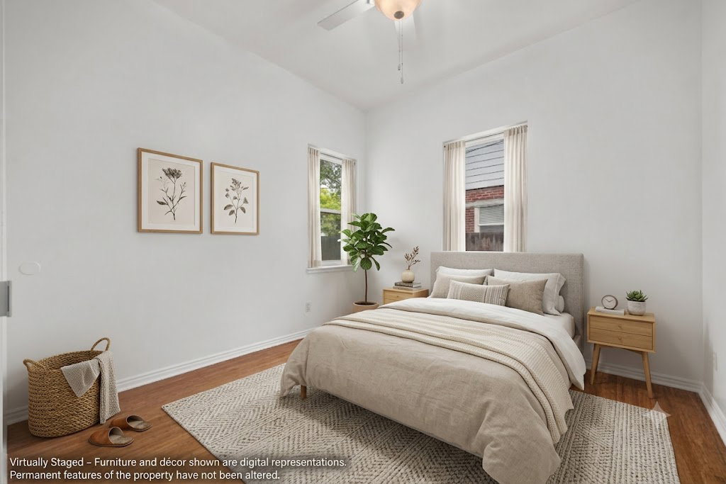 AI staged bedroom featuring wood-finish flooring, white baseboards, and two windows