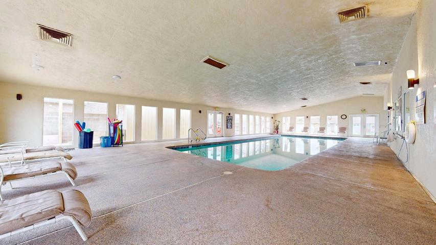Indoor swimming pool with concrete decking
