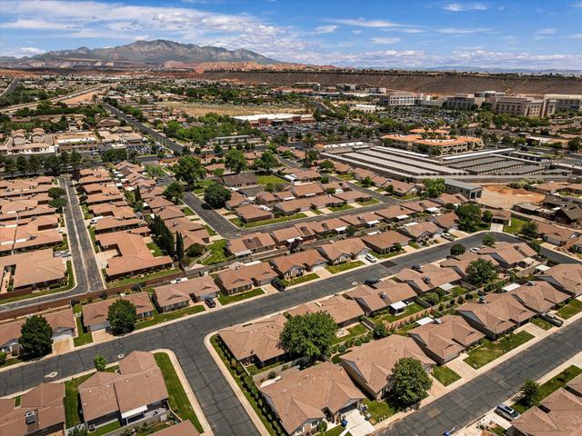 Aerial perspective showcasing residential properties with brown tile roofing