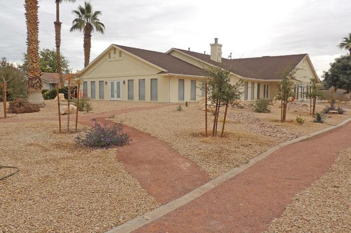 Single-story property featuring a stucco exterior and a hip roof