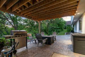 Covered outdoor patio with stamped concrete flooring