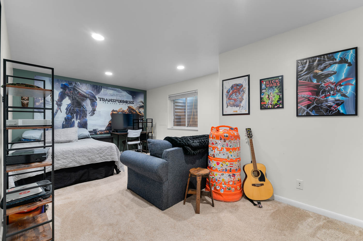 Carpeted interior space featuring recessed lighting, a window with horizontal blinds