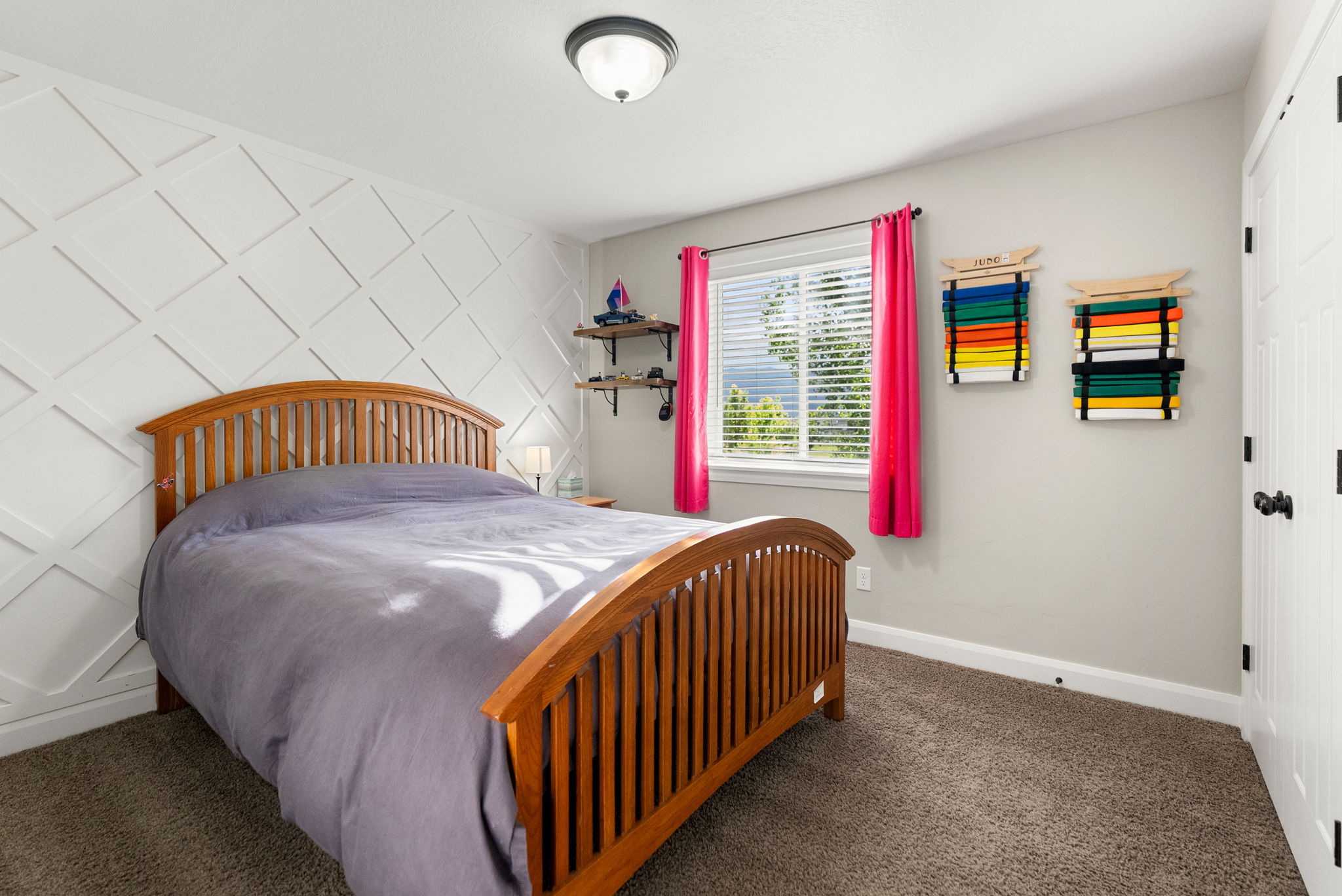 Accent wall with diamond-patterned millwork