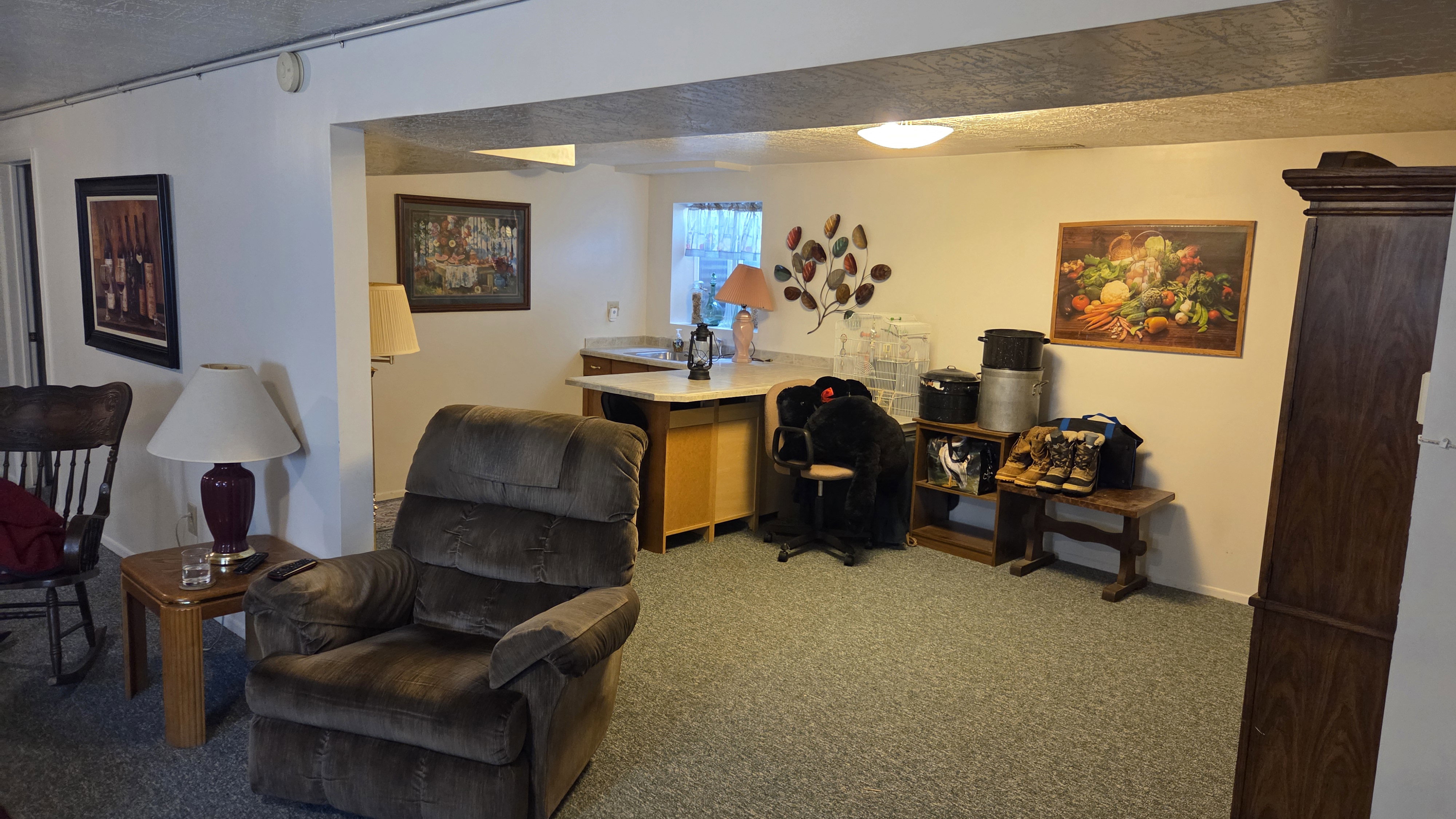 Open concept living area with carpeting and recessed lighting