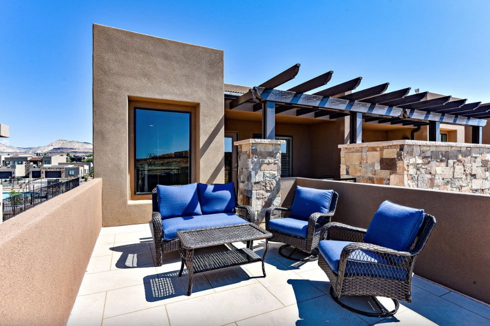 Expansive outdoor patio featuring light-colored tile flooring