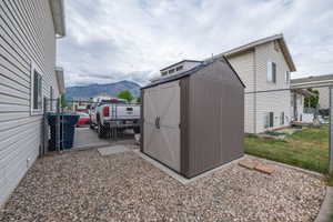 Gable-roof storage shed with dual front doors