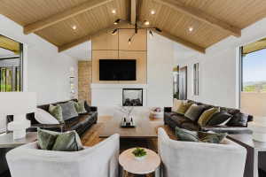 Vaulted wood-finish ceiling with exposed beams