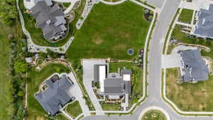 Contemporary aerial rendering showcasing a residential neighborhood with paved streets
