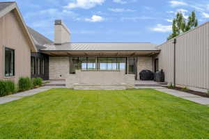 Manicured lawn with concrete paver pathways
