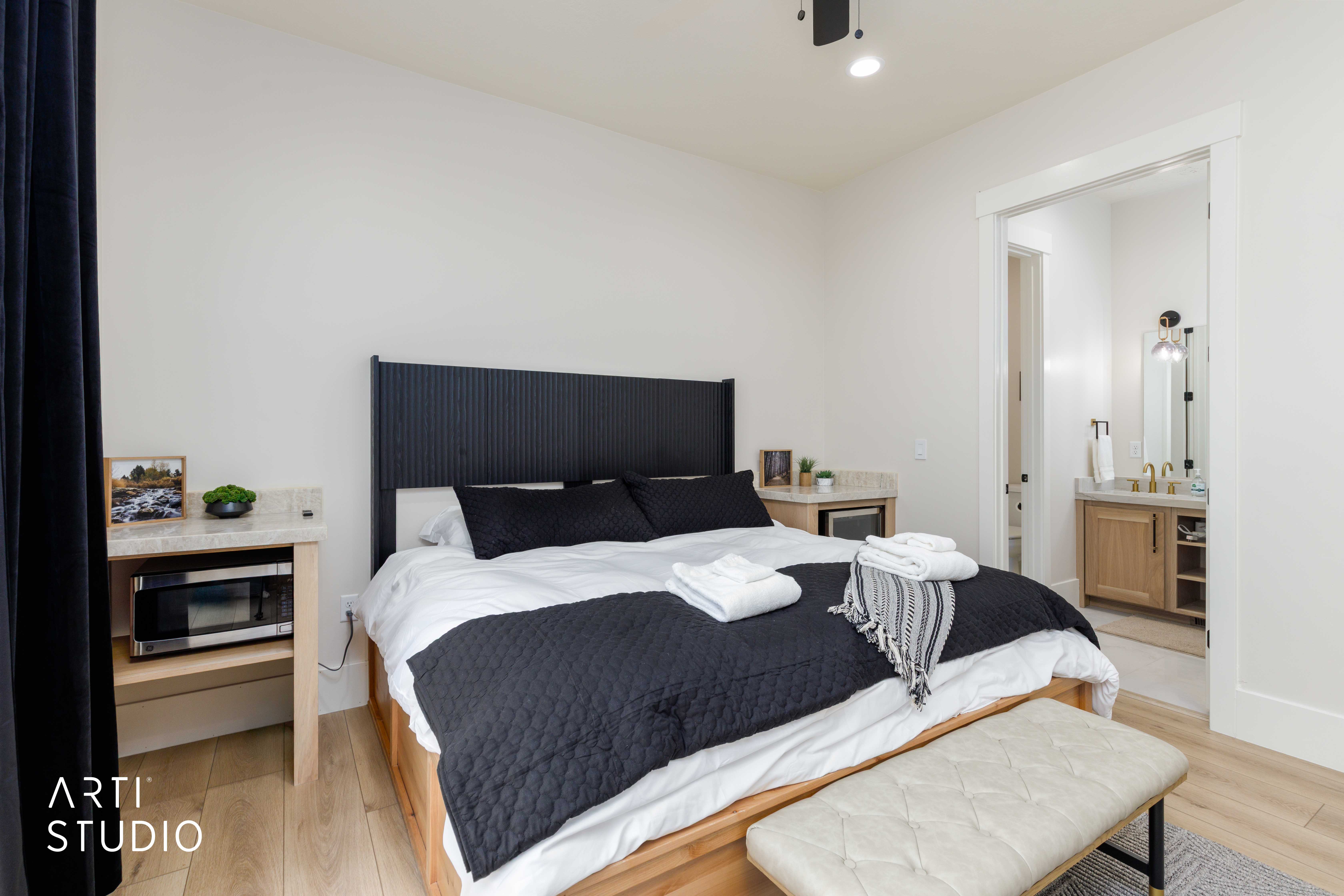 Light-colored wood-finish flooring complements white walls and modern trim