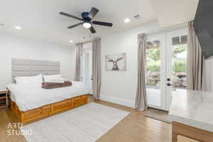 Spacious room featuring wood-finish flooring, recessed lighting, and a ceiling fan