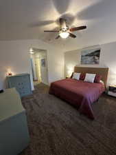 Spacious room with plush carpeting and a ceiling fan with integrated lighting