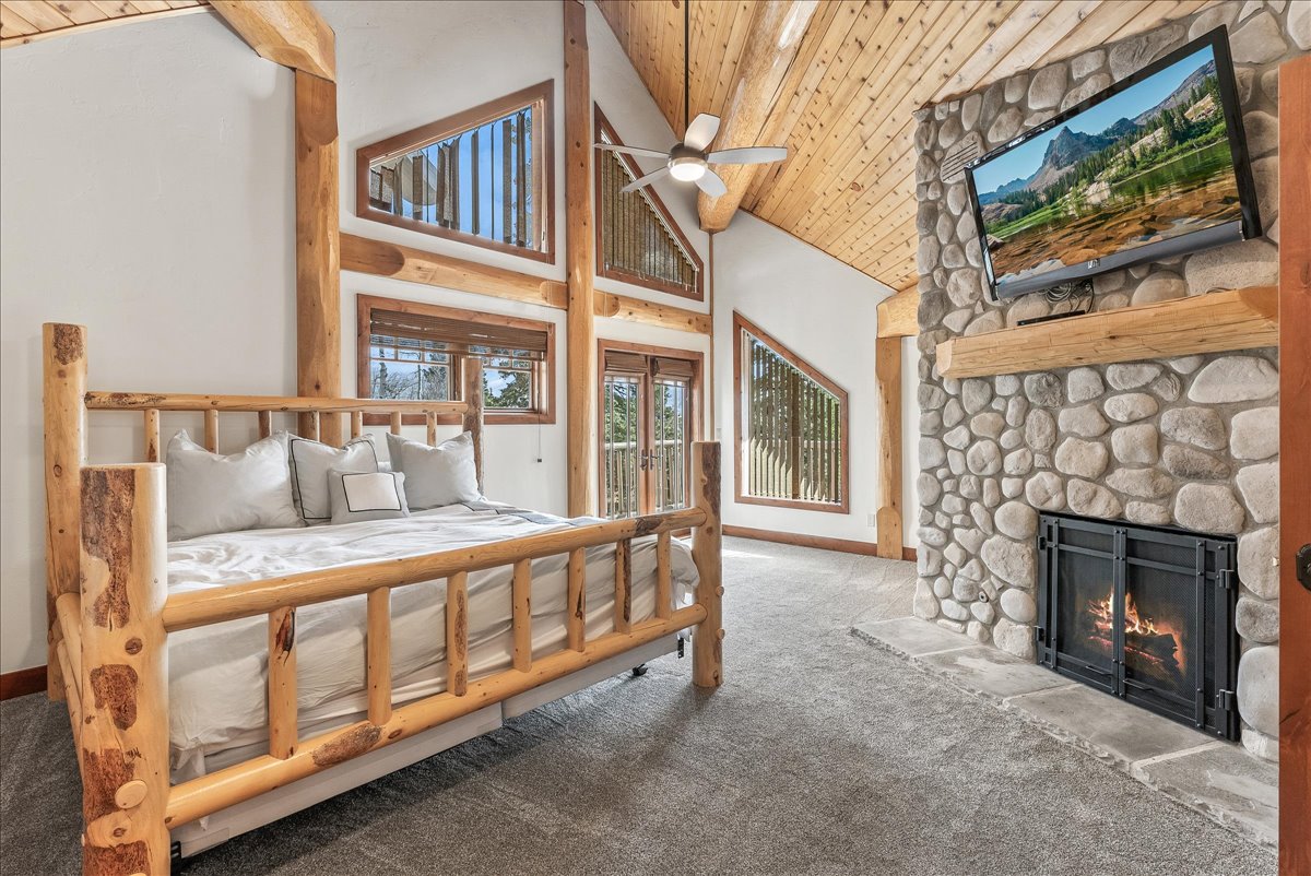 Vaulted wood-paneled ceilings with exposed wood beams