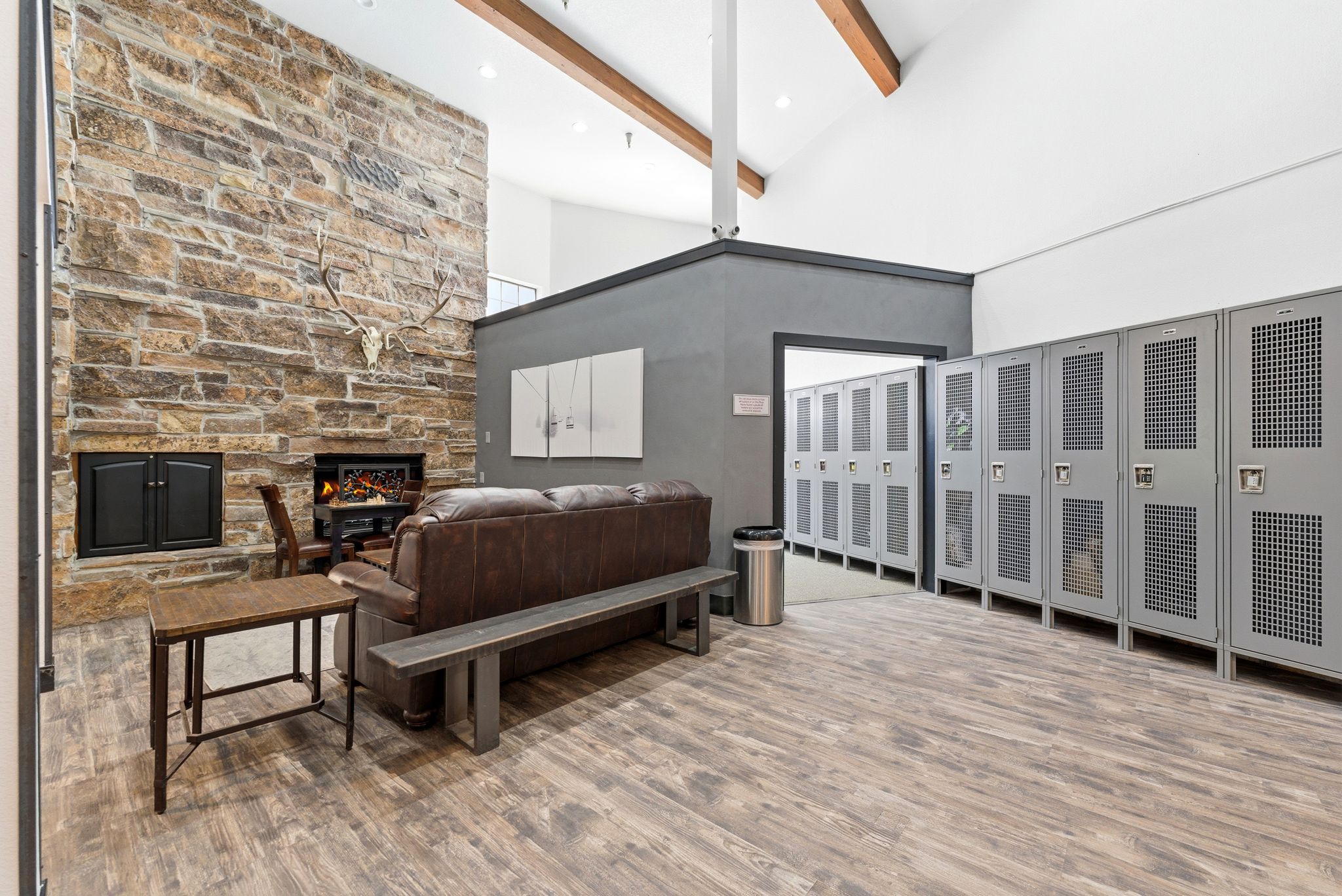 Stone fireplace with black firebox and hearth