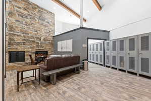 Stone fireplace with black firebox and hearth