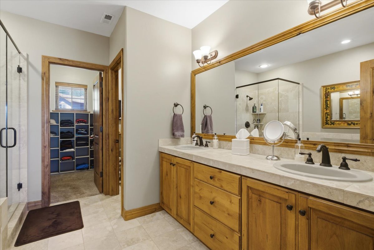 Master bathroom featuring a spacious closet