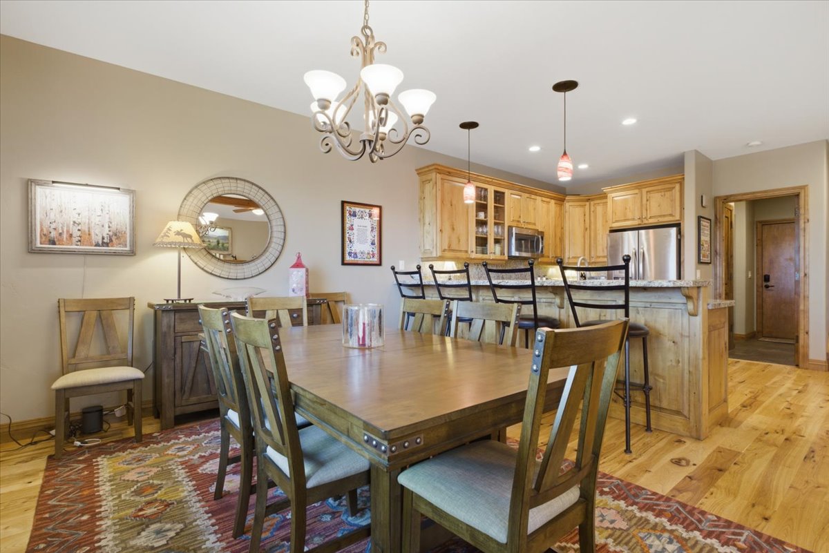 Open-concept living area featuring wood-finish flooring