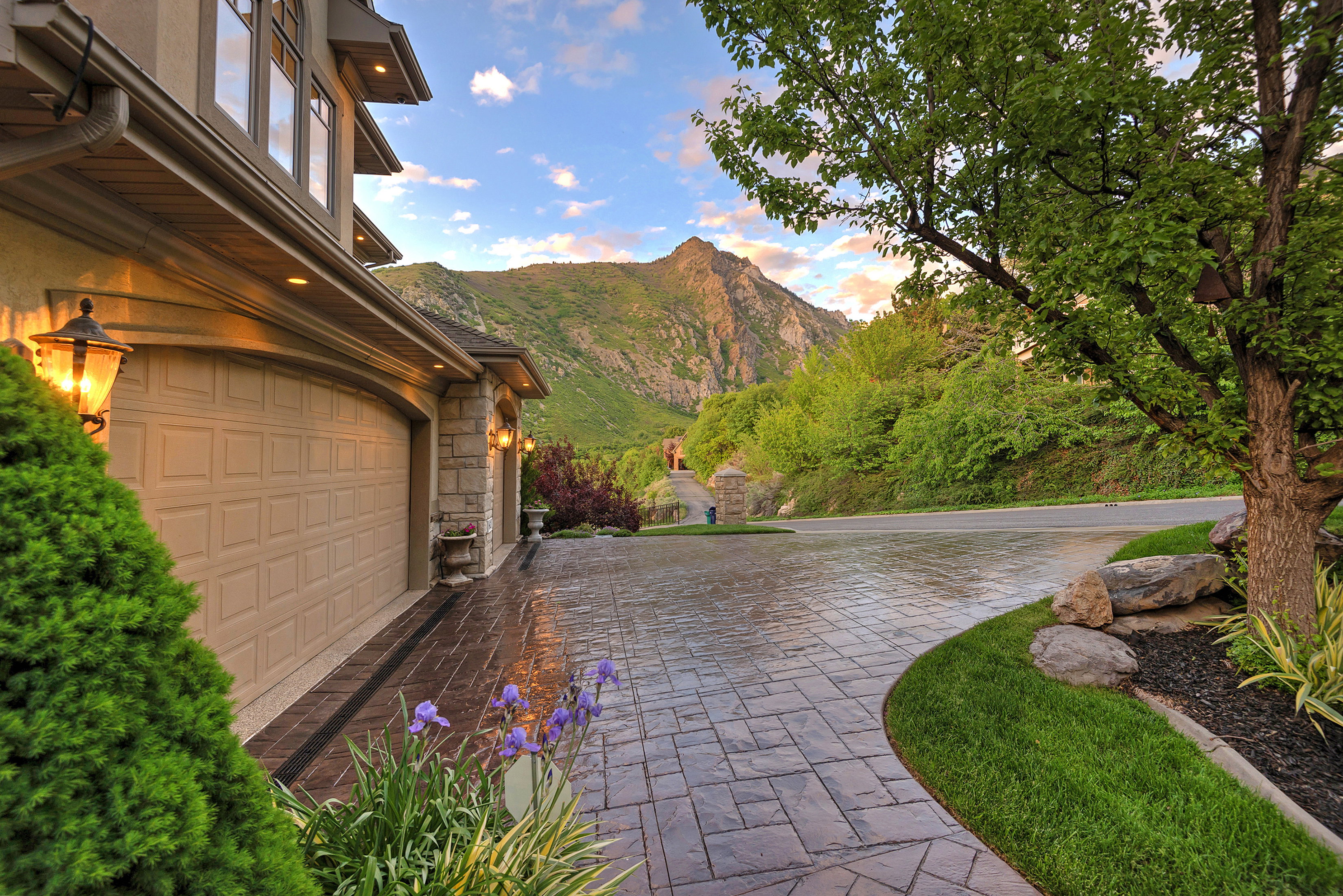 Stamped concrete driveway providing access to the two-car garage