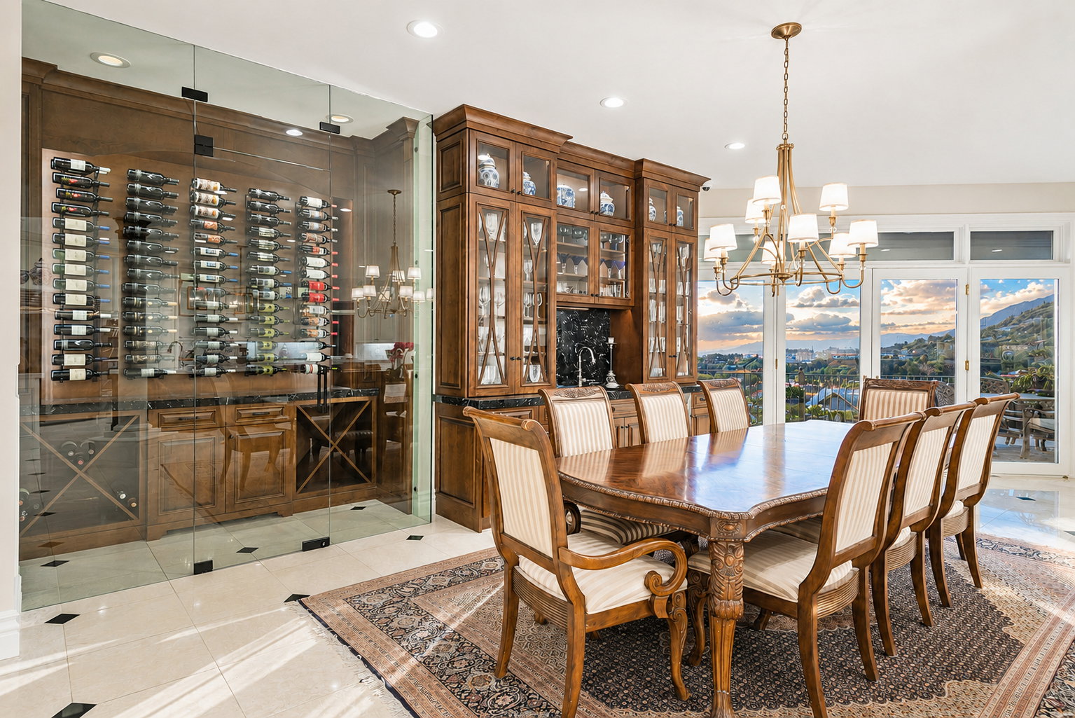 Dedicated wine cellar with glass enclosure, wood-finish cabinetry, and contemporary wine racking