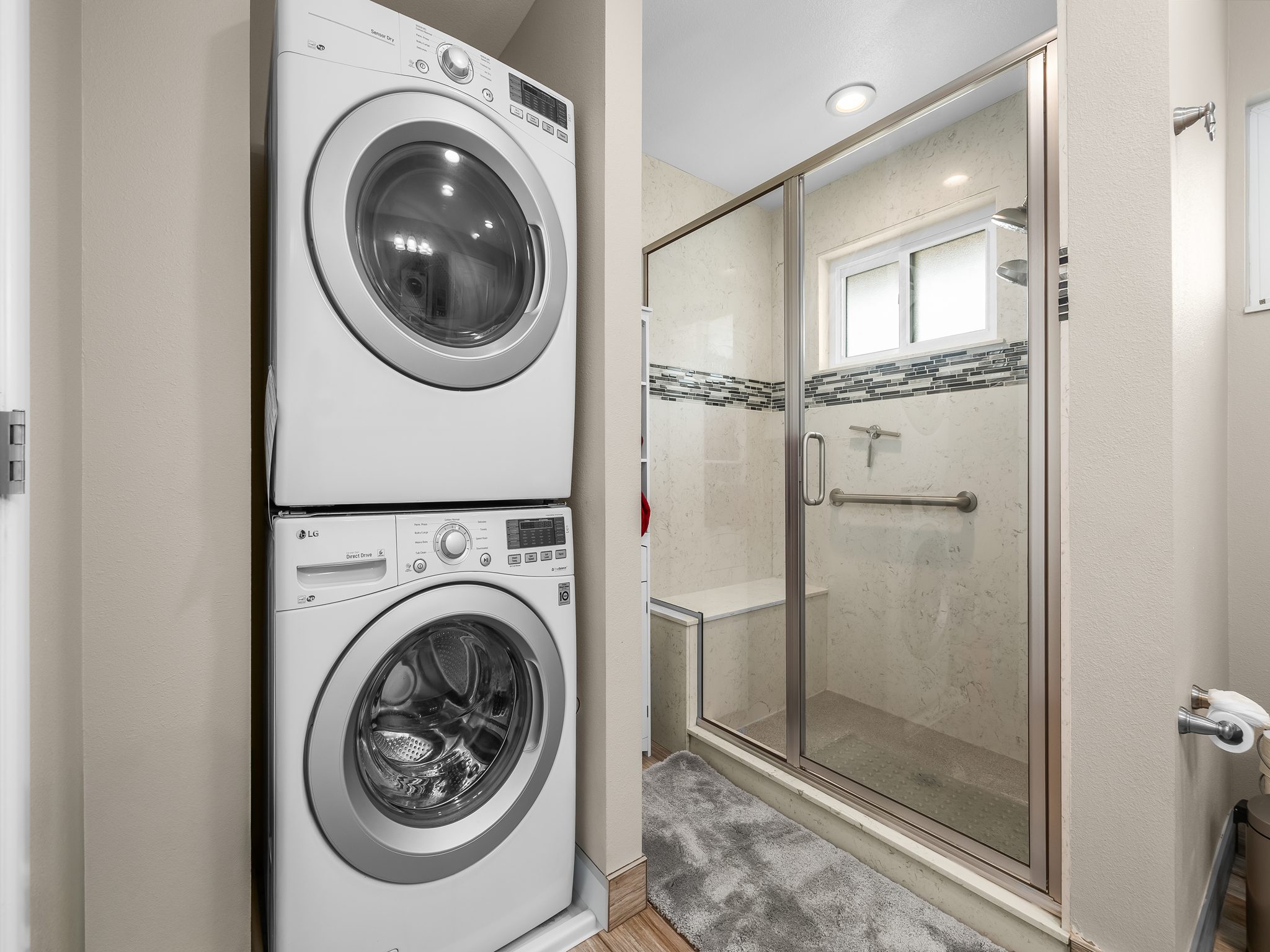 Stacked washer and dryer units