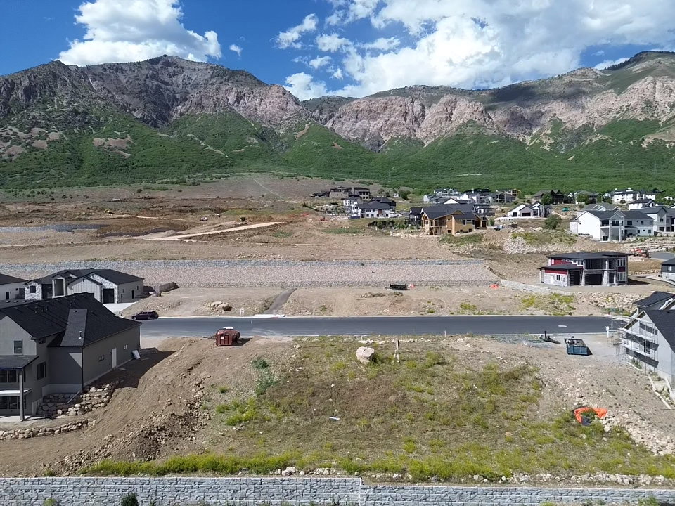 Mountainous terrain framing a developing residential area