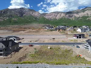 Mountainous terrain framing a developing residential area