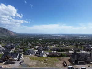 Elevated property featuring a mountainous backdrop and established neighborhood