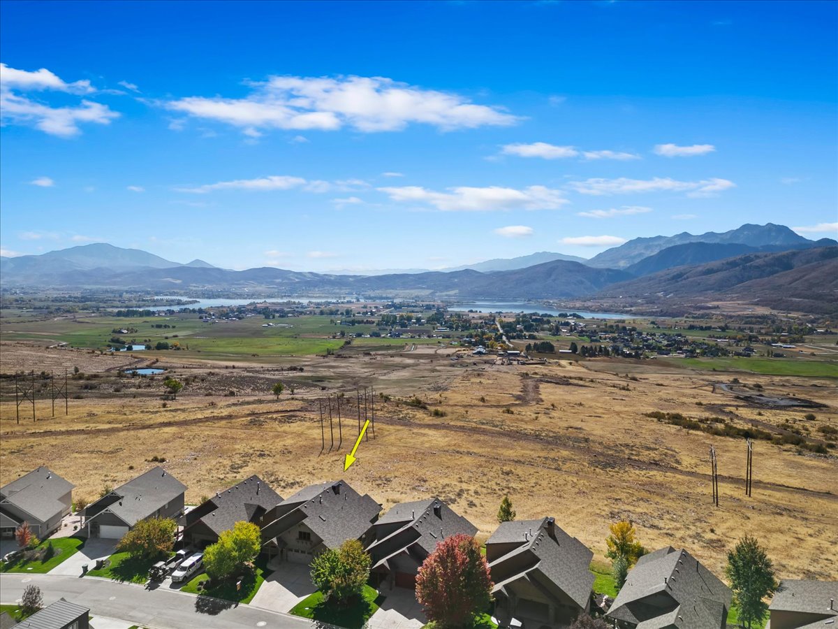 Expansive mountain and lake scenery with varied terrain