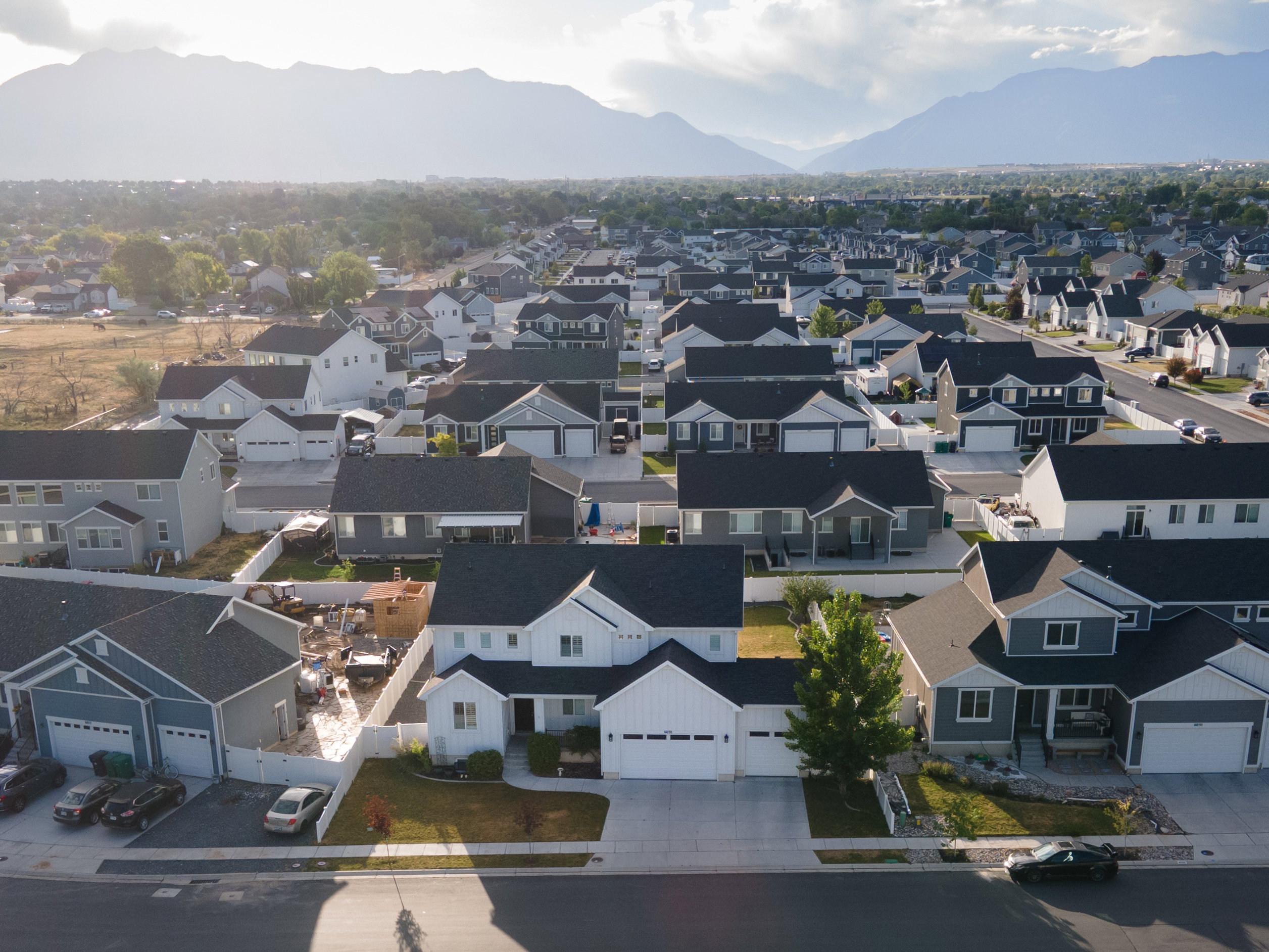 Expansive suburban neighborhood with mountain backdrop