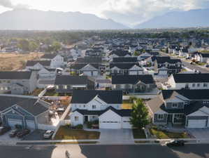 Expansive suburban neighborhood with mountain backdrop