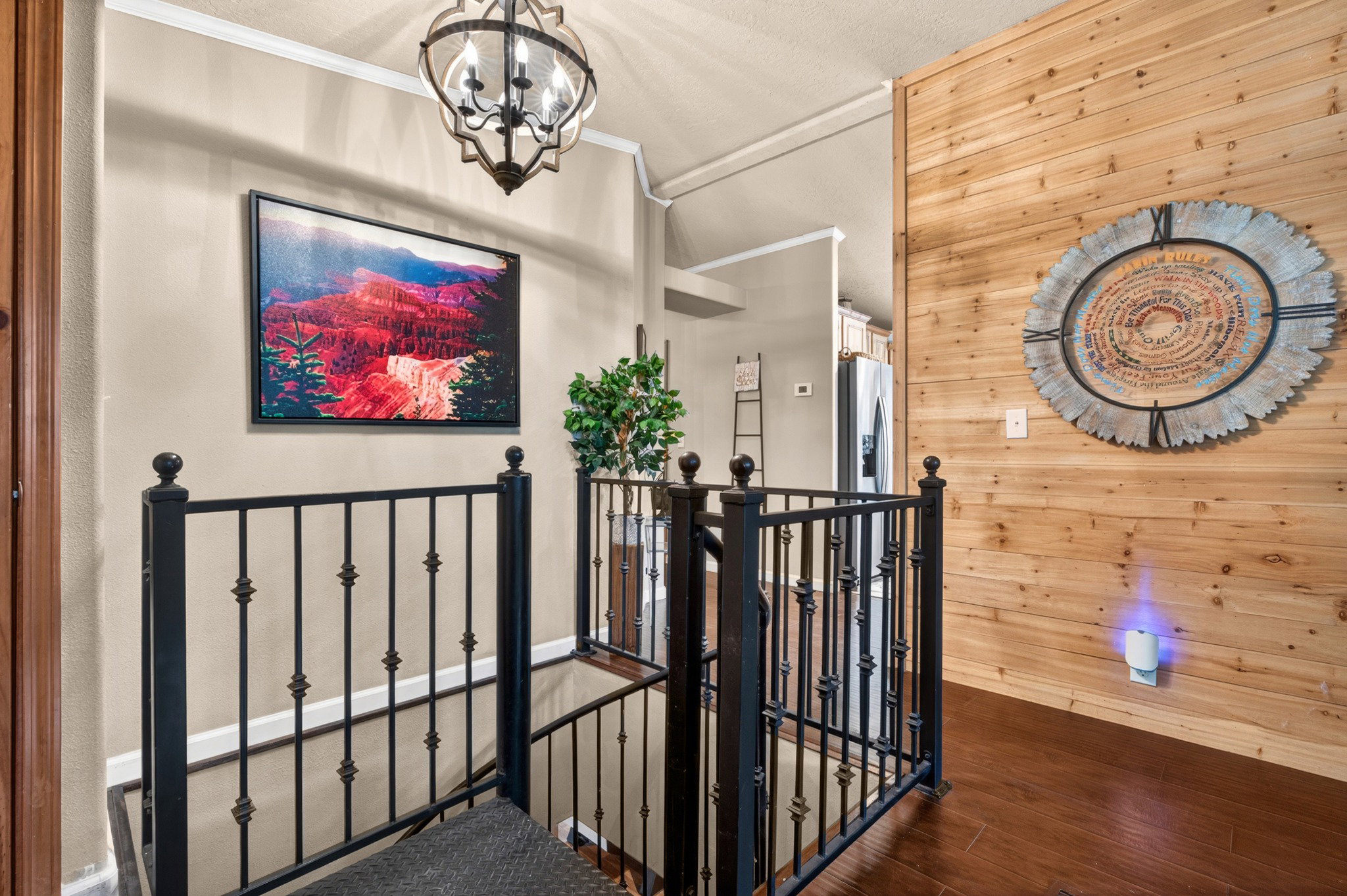 Ornate wrought iron railing framing a staircase