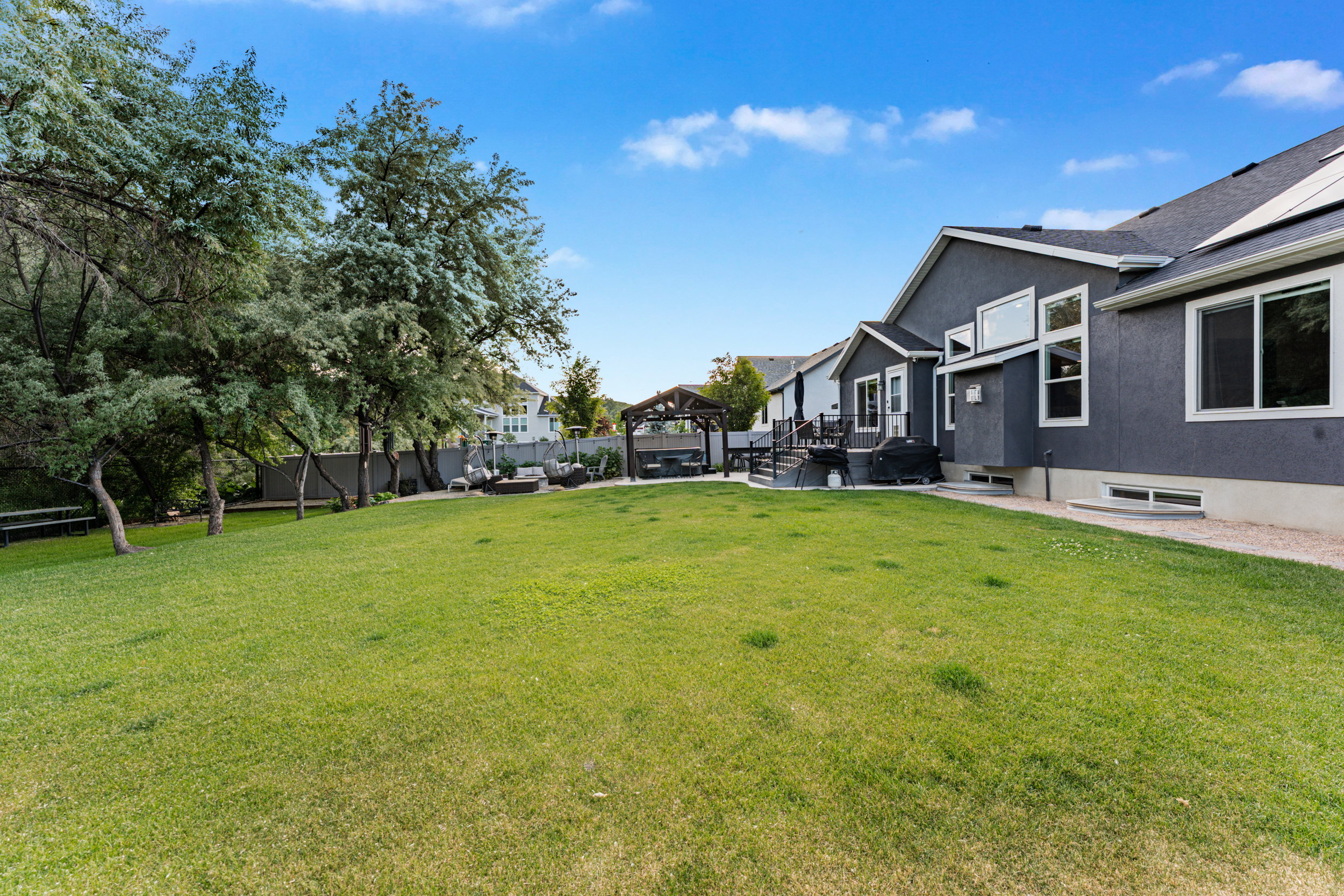 Expansive green lawn providing ample outdoor space