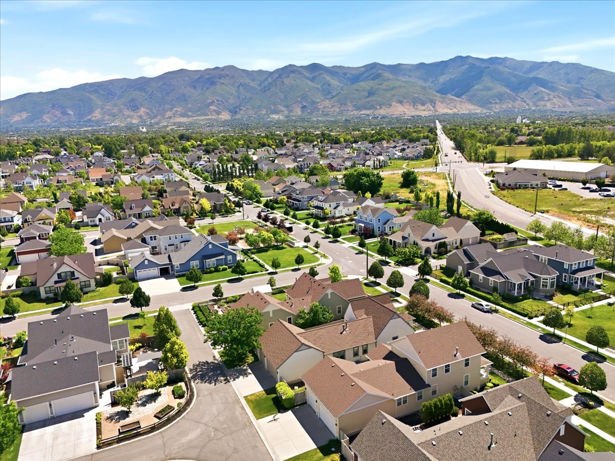 Residential neighborhood featuring diverse architectural styles and mature landscaping