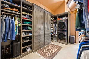 Built-in custom cabinetry system with integrated drawers and hanging storage